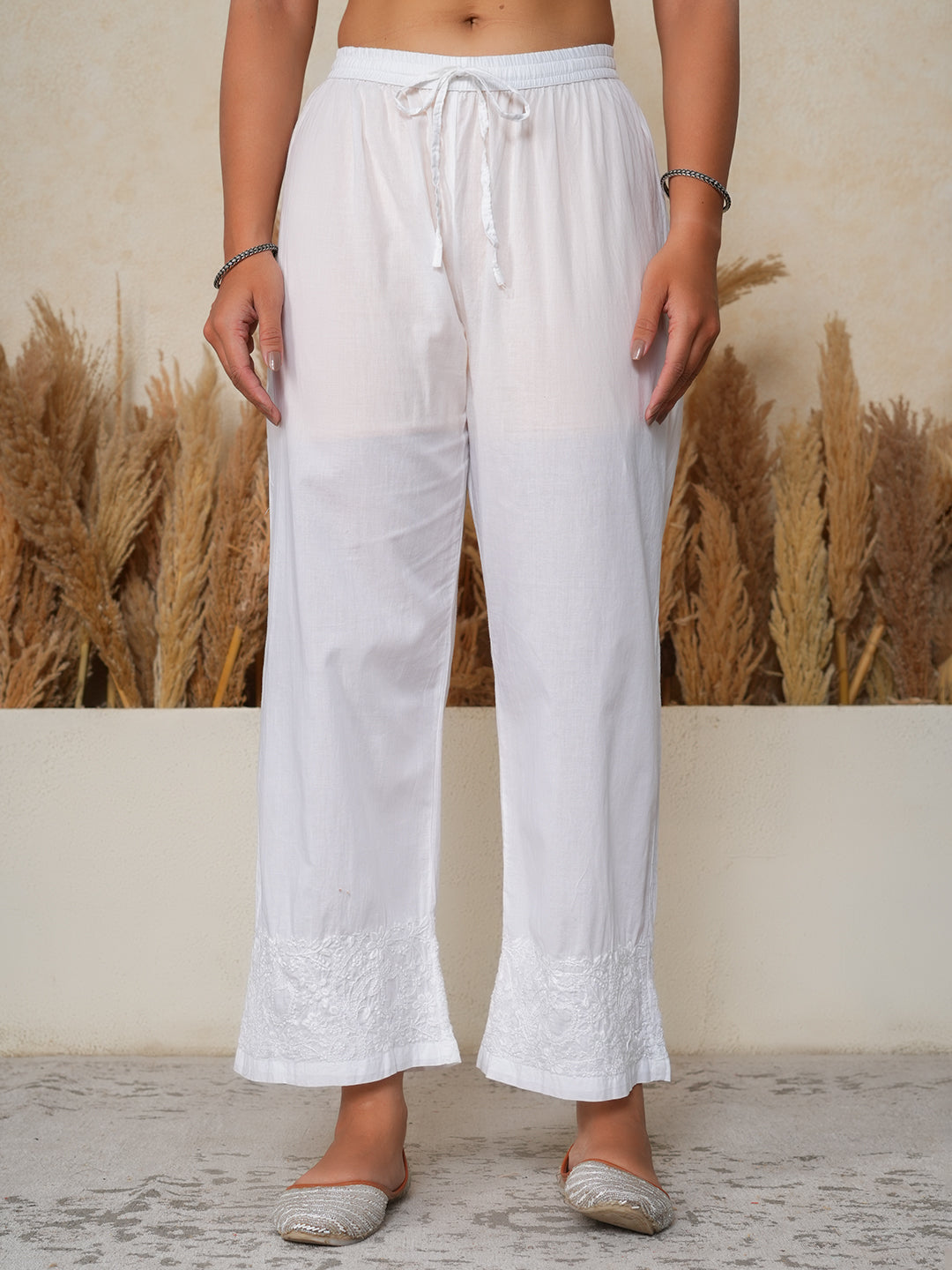New Chikankari Pants with Intricate jaal chikankari embroidery at bottom. The free size elastic waist