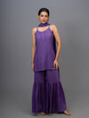Zehnab! Muslin Chikankari Sharara paired with a sleek spaghetti strap purple kurta