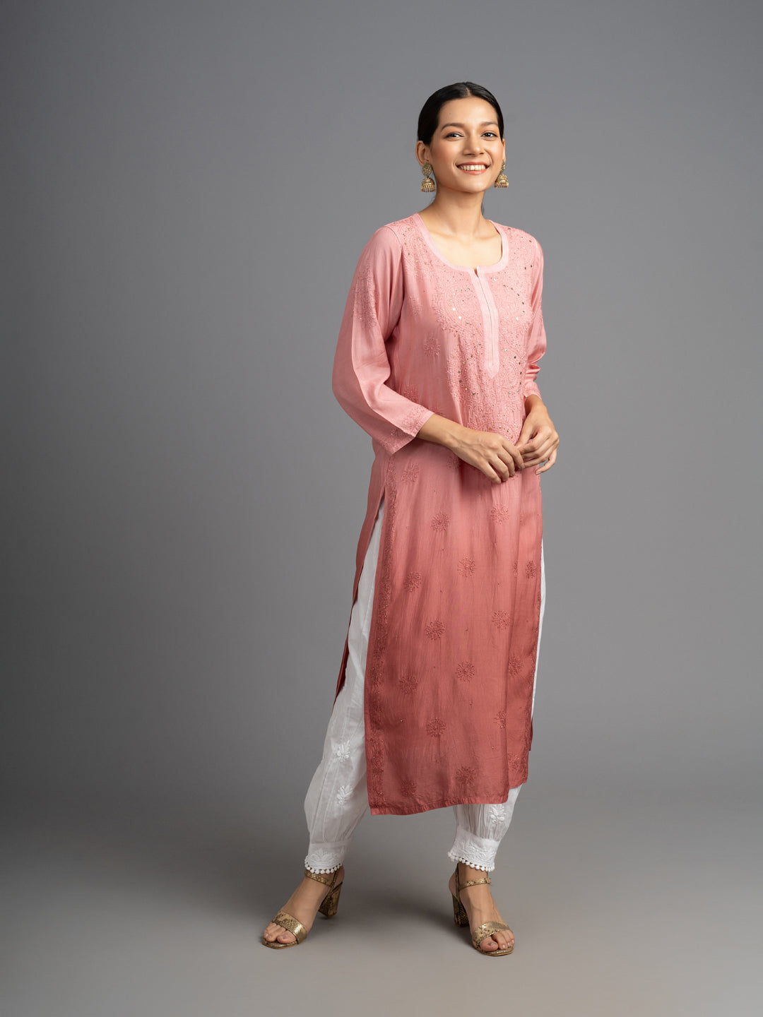 Shahana: Muslin Chikankari kurti, adorned with traditional Bakhiya embroidery and shimmering Mukhesh Peach