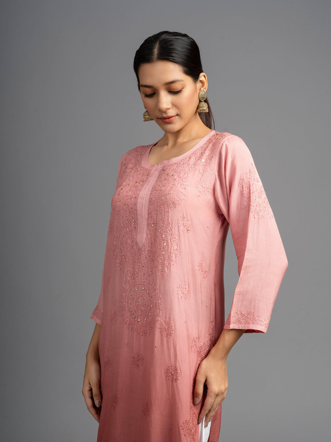 Shahana: Muslin Chikankari kurti, adorned with traditional Bakhiya embroidery and shimmering Mukhesh Peach