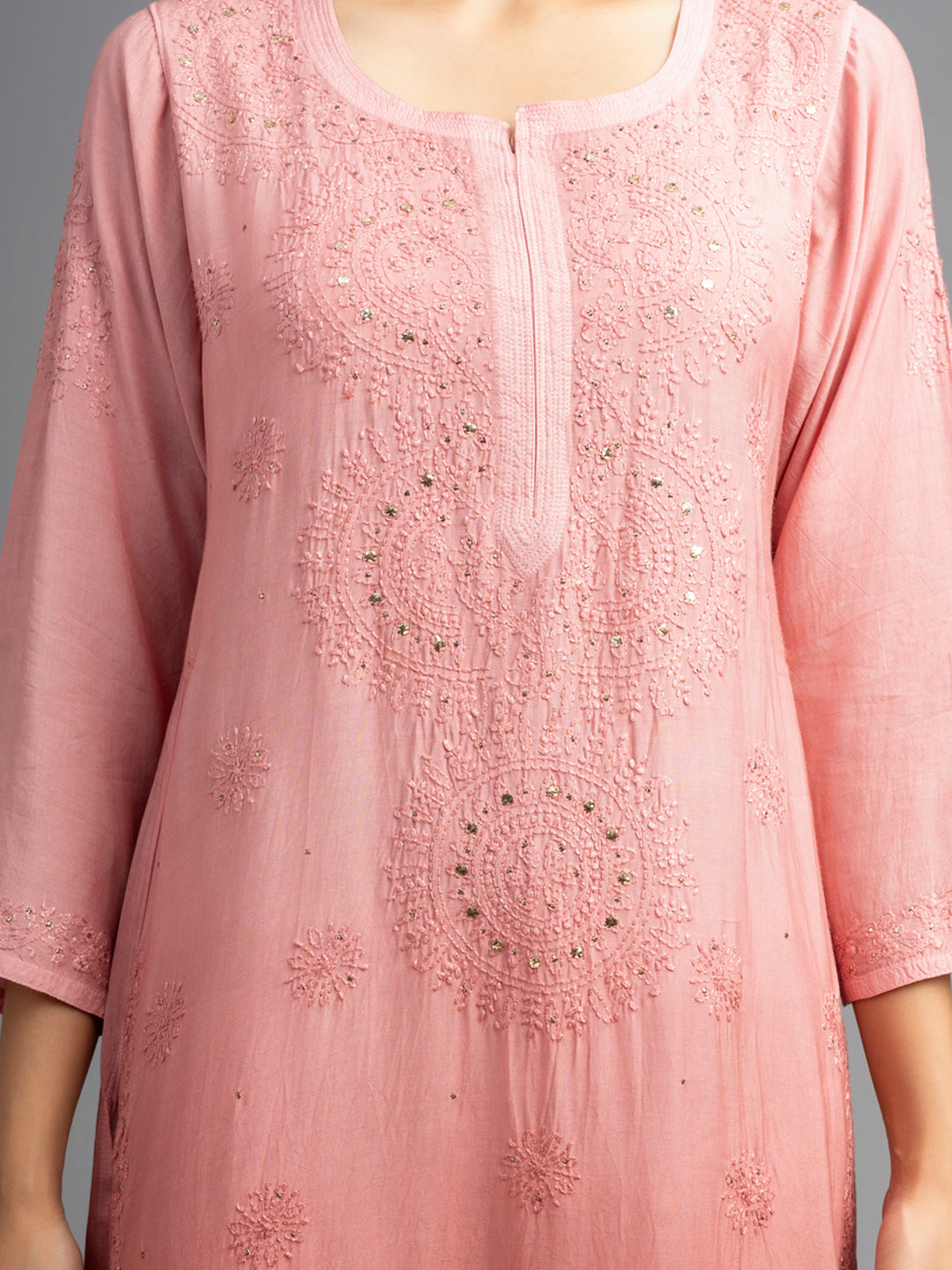 Shahana: Muslin Chikankari kurti, adorned with traditional Bakhiya embroidery and shimmering Mukhesh Peach